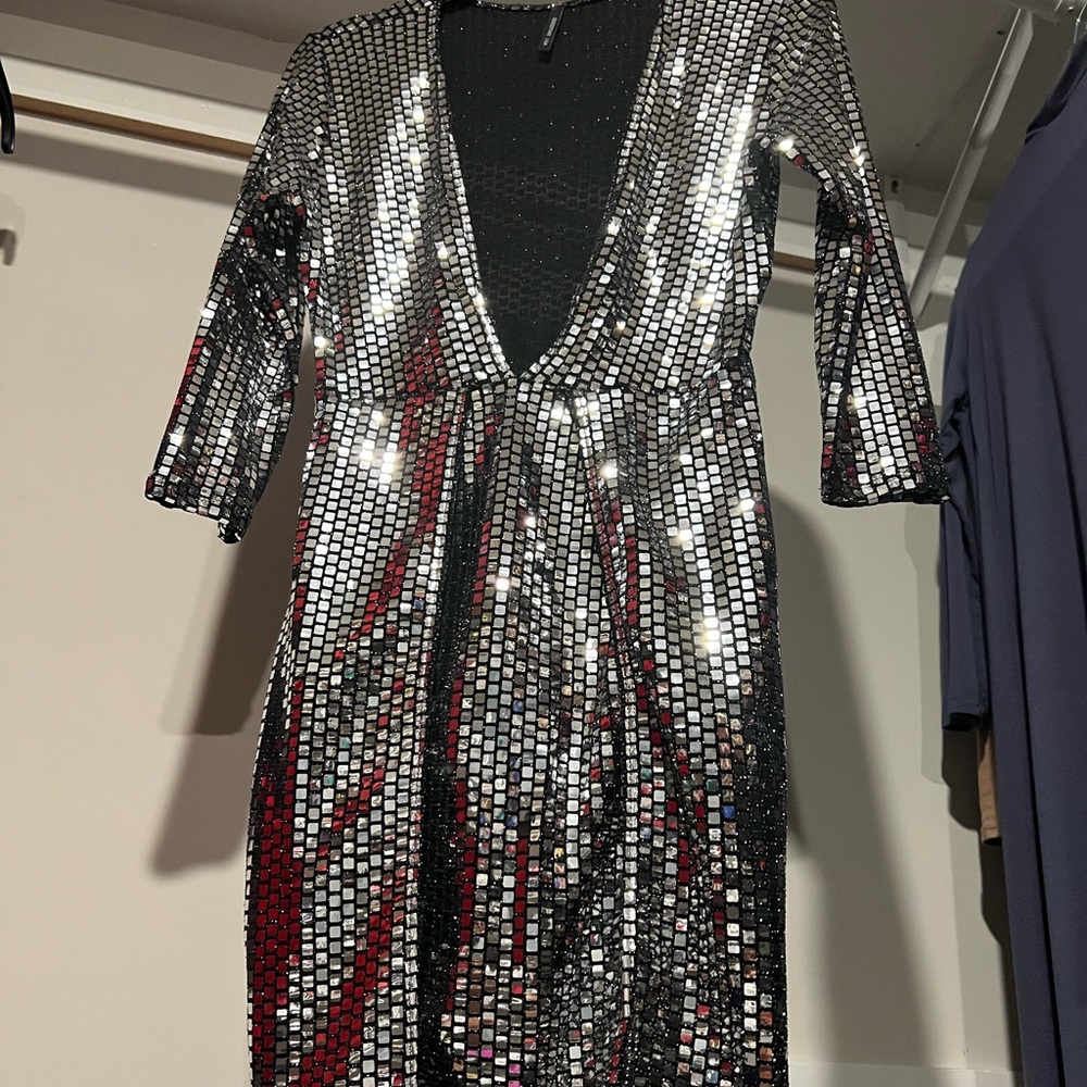Black and silver evening dress, worn once,size medium